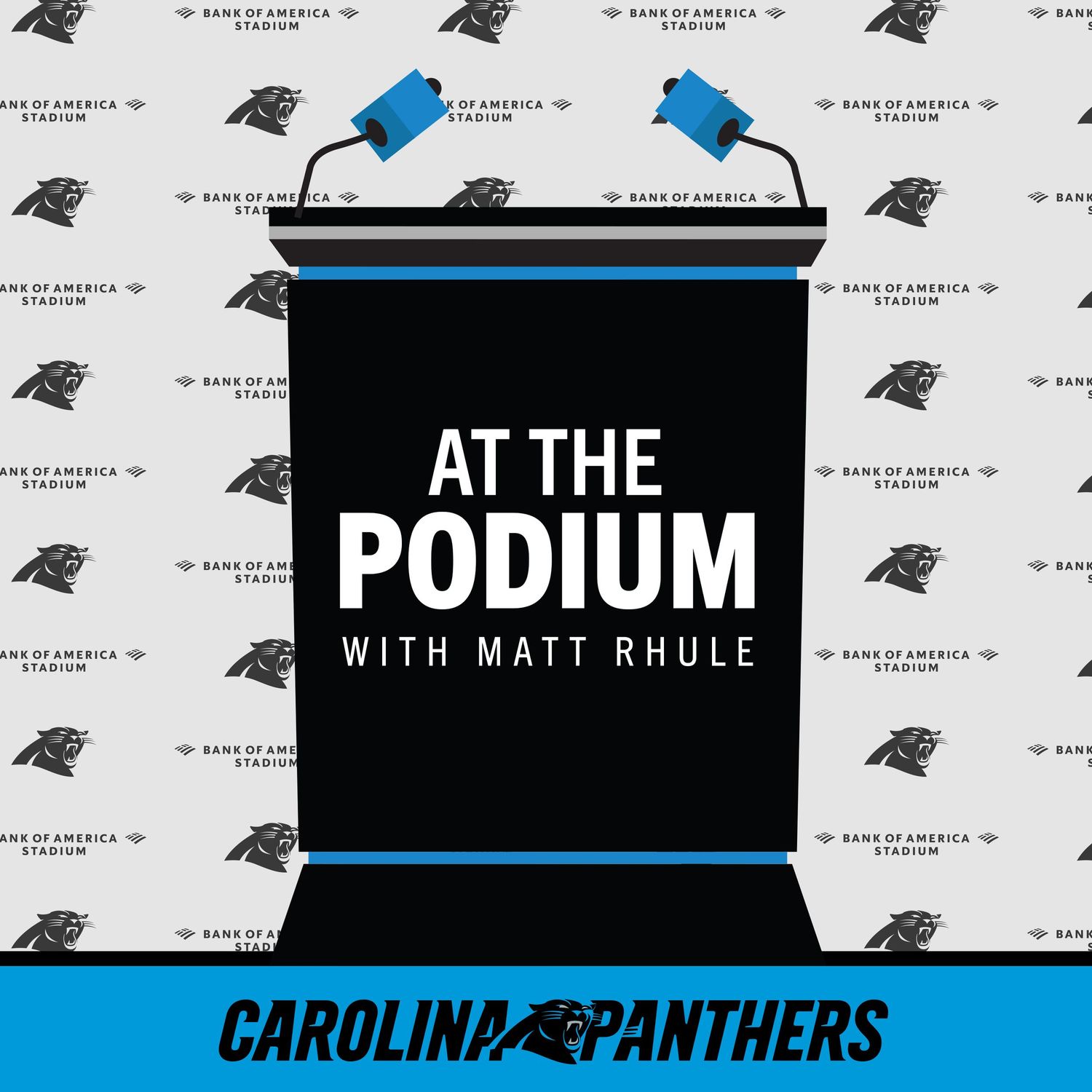 Carolina Panthers 'At The Podium with Matt Rhule' podcast logo featuring a podium at Bank of America Stadium.