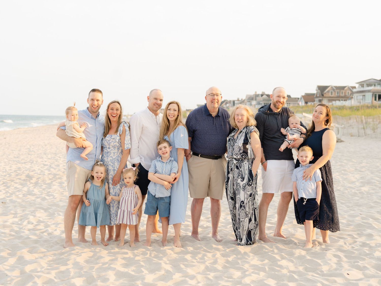 Extended family fun photo session at ocean county nj beach.