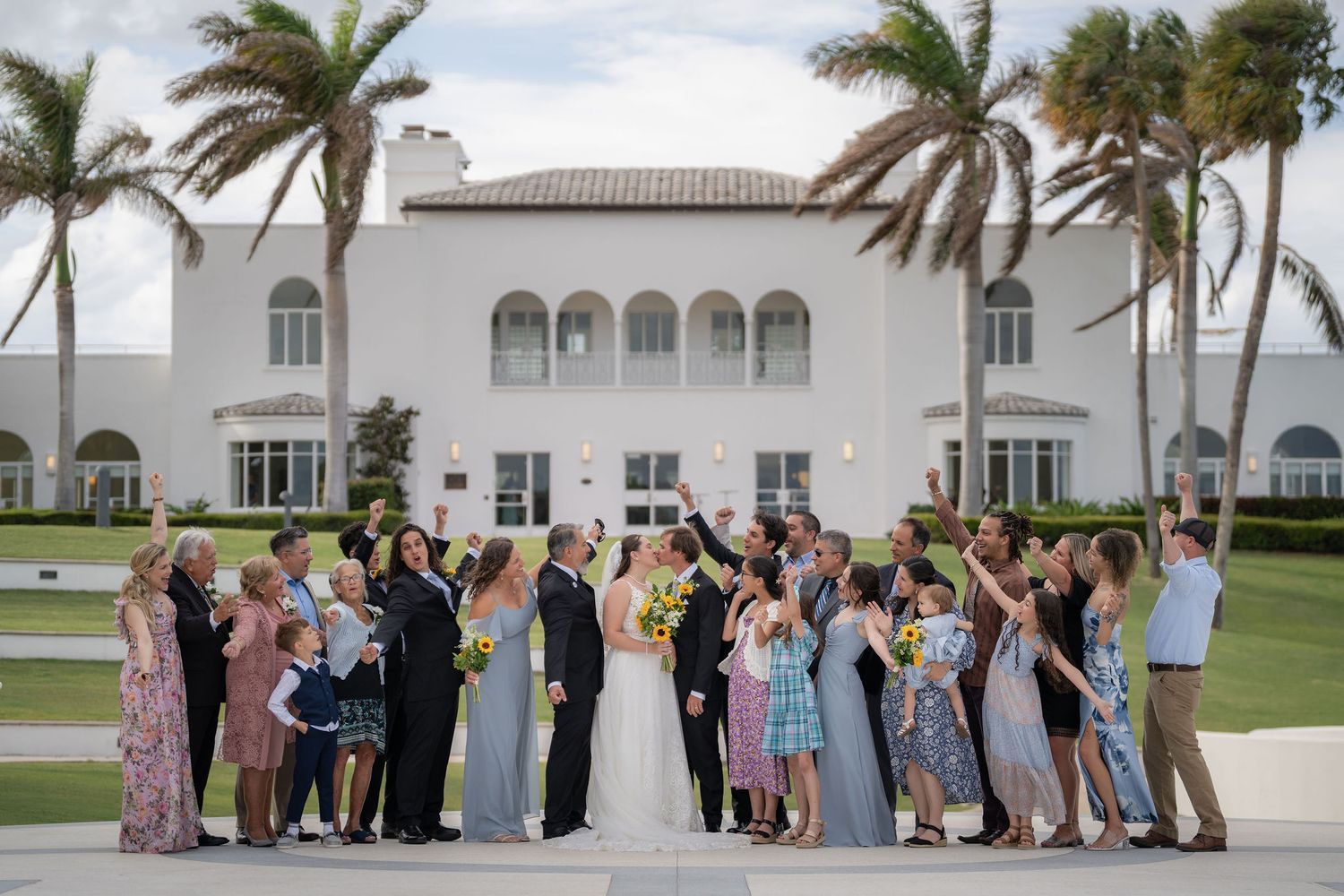 Large family portrait on the South Terrace with the Mansion at Tuckahoe behind the group