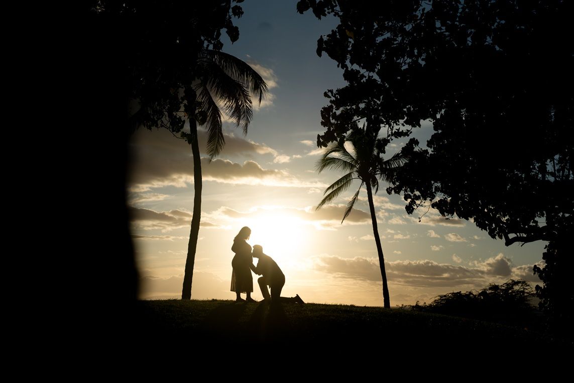 Maui maternity photographer photo against beautiful Maui sunset beach by ohwowfotos.