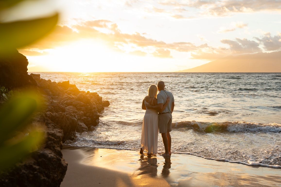 Maui family photographer photo against beautiful Maui sunset beach by ohwowfotos.
