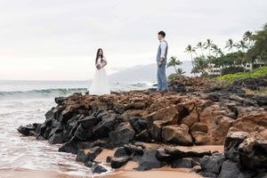 Maui wedding photographer photo against beautiful Maui sunset beach by ohwowfotos.