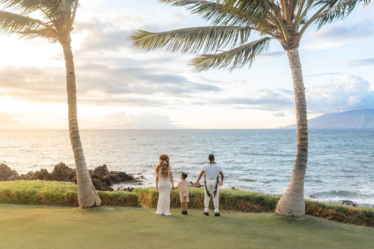 Maui wedding photographer photo against beautiful Maui sunset beach by ohwowfotos.