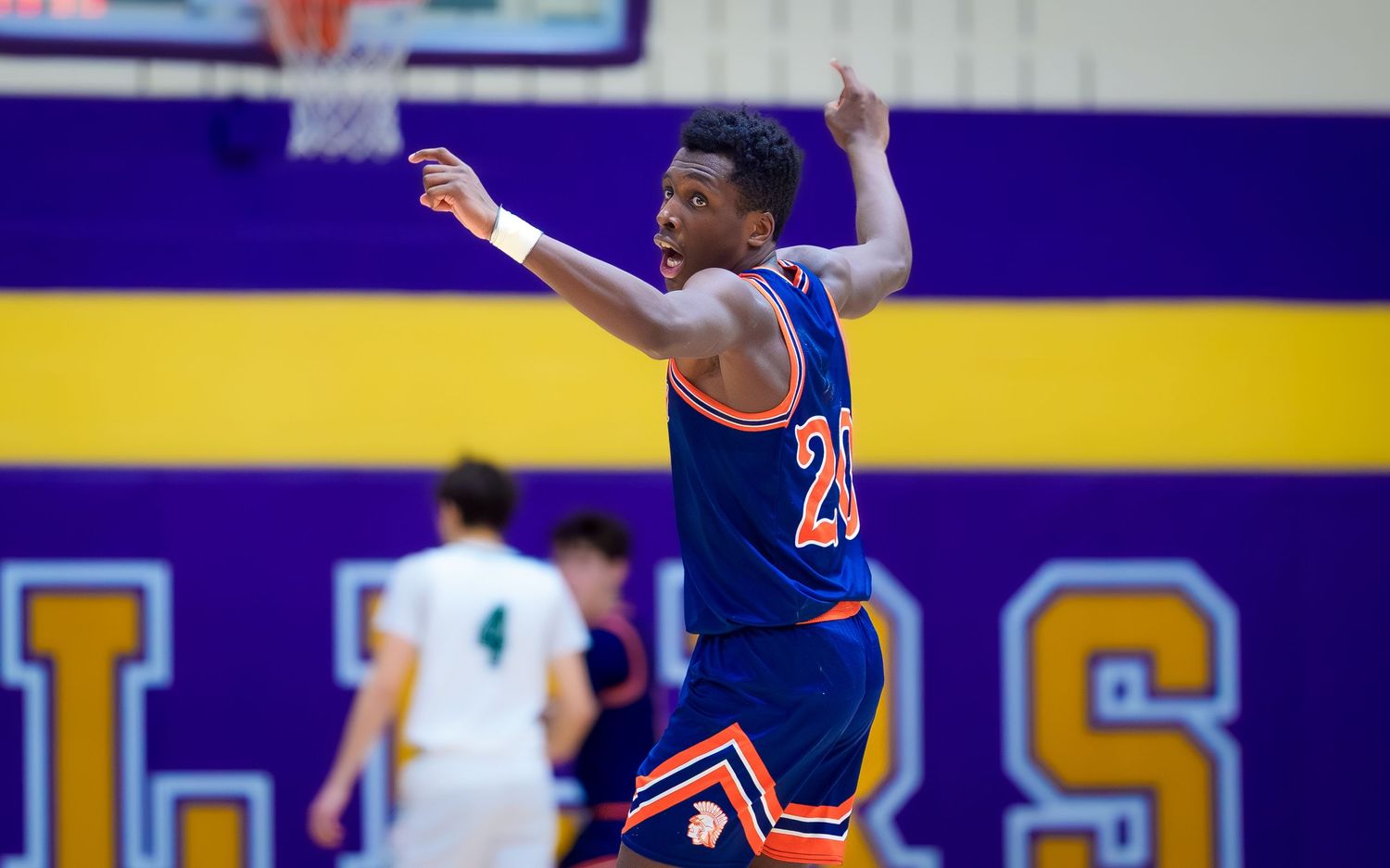Hershey boys basketball player celebrating a buzzer beater win against Carlisle, by Deanna Fox, SportsFox Photography based in Hershey PA