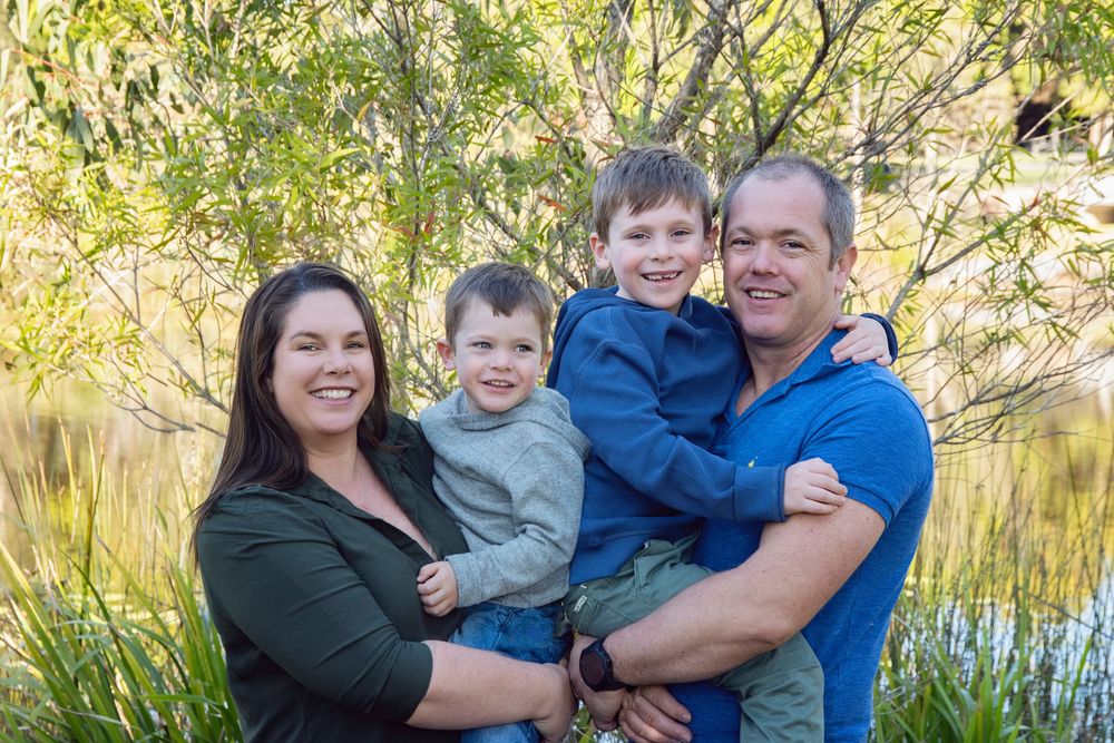 beautiful family of 4 in a park in pimpama for their photo session