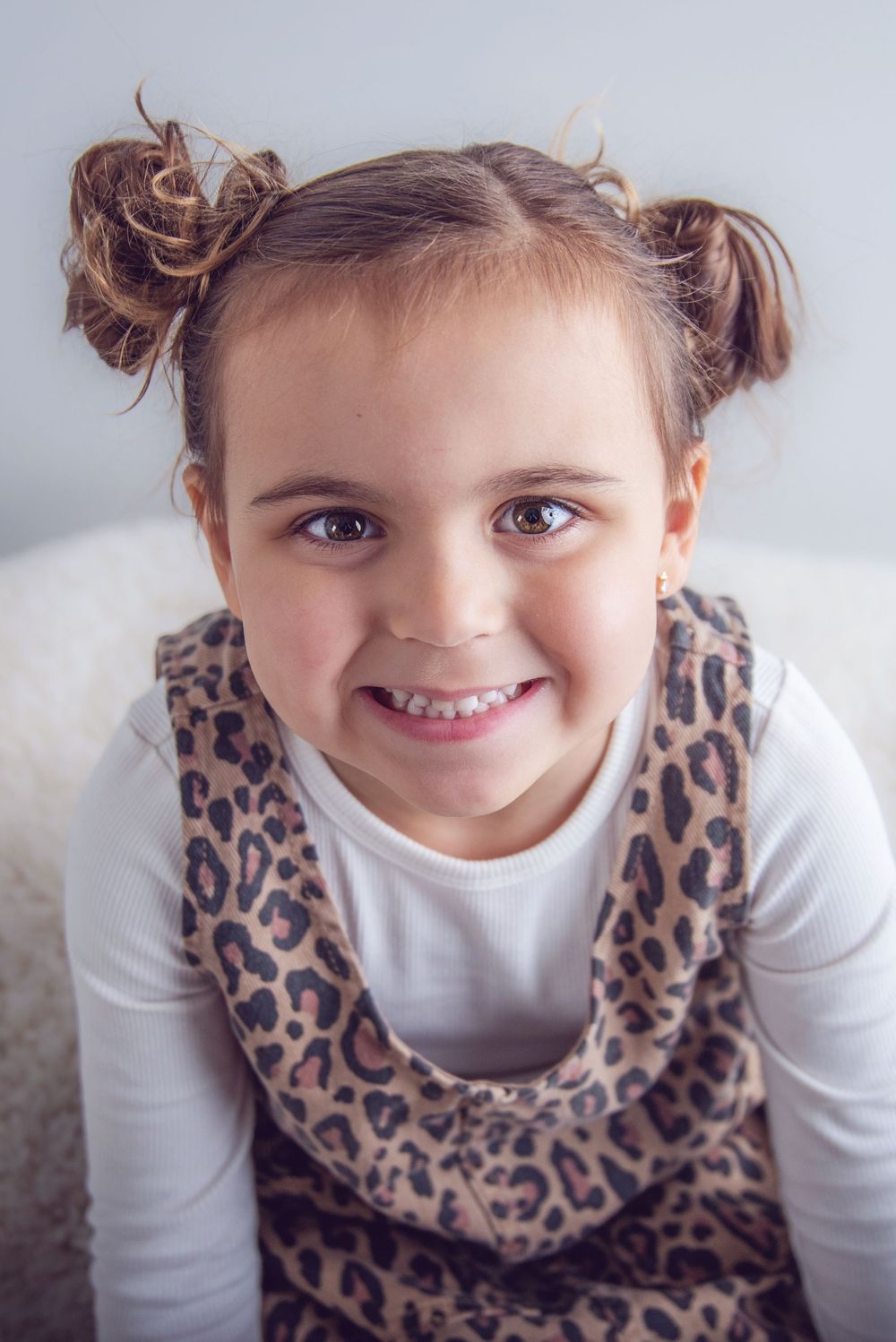 big smiles for this beautiful girl at her photography session