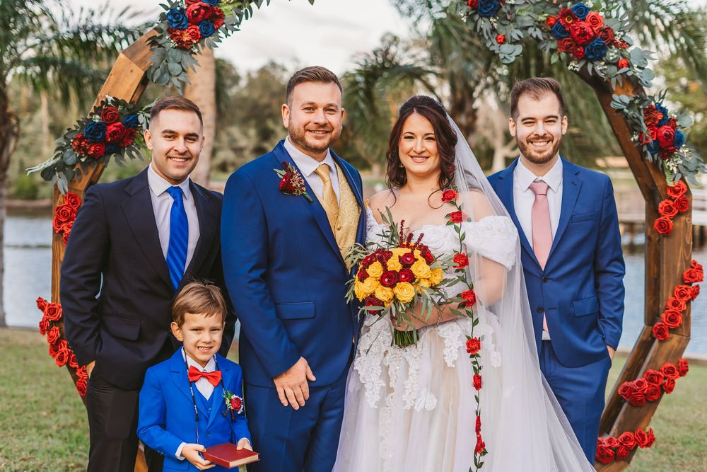 Channel Side Club in Palm Coast Florida. Wedding photography. Formal portraits of bride and groom with family and bridal party.