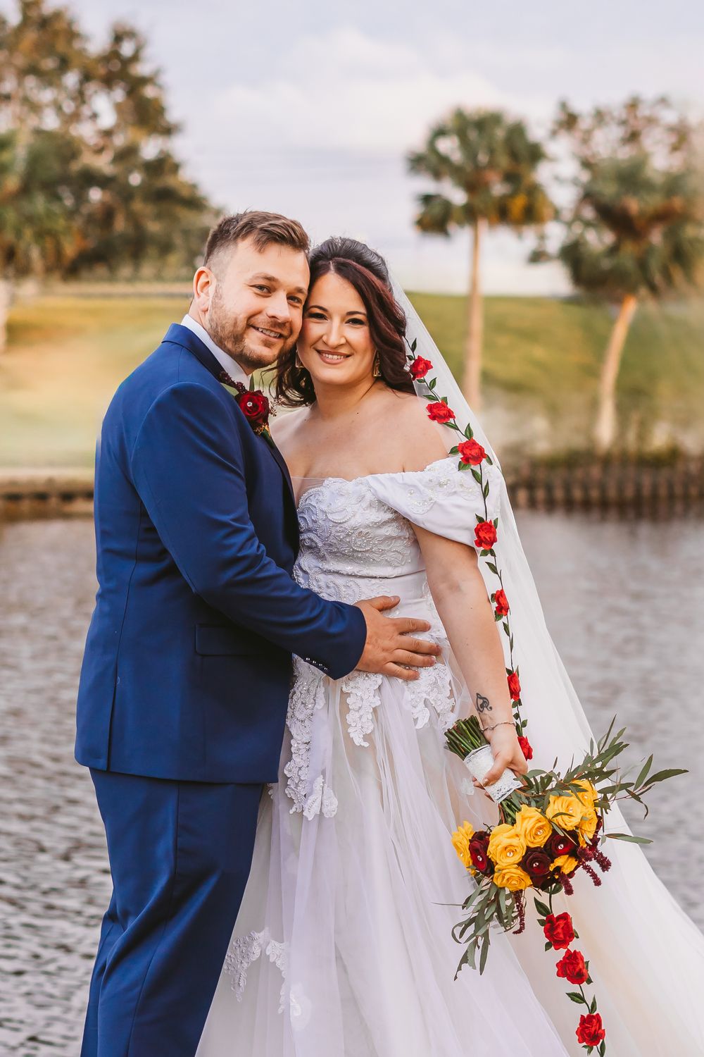 Channel Side Club in Palm Coast Florida. Wedding photography. Formal portraits of bride and groom by the water.