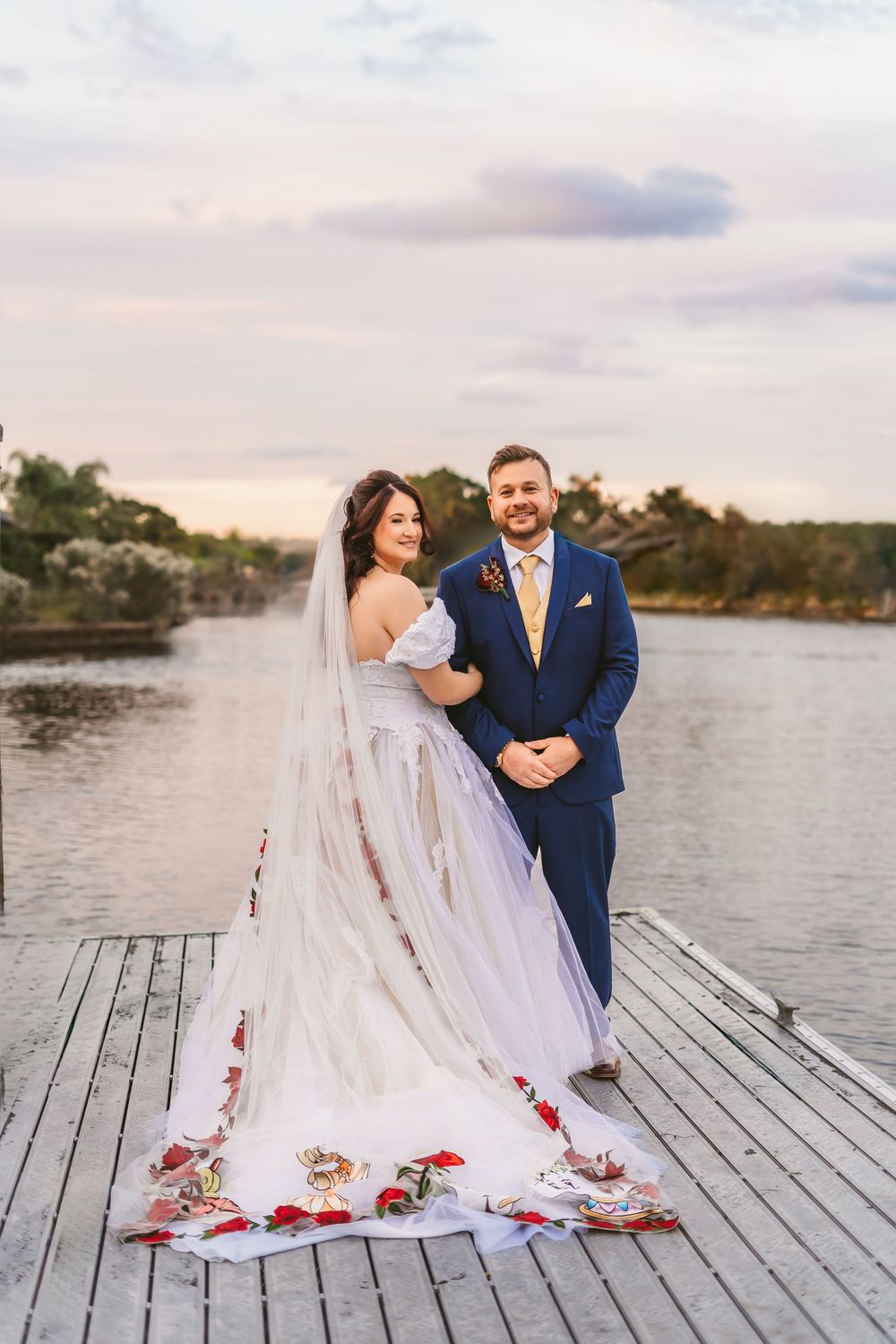 Channel Side Club in Palm Coast Florida. Wedding photography. Formal portraits of bride and groom by the water.