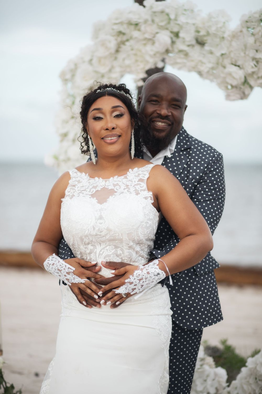 Newlywed couple embracing in elopement wedding at Crandon Park Miami.