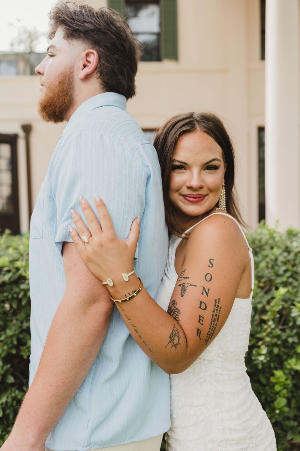 Couple during their romantic engagement session at Bayou Bend Collection and Gardens in Houston, Texas.