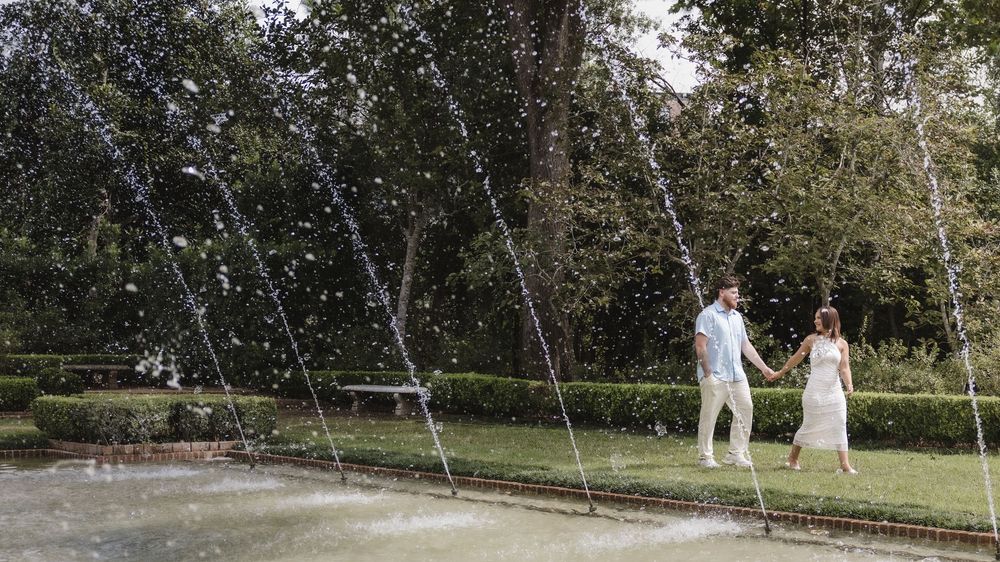 Couple during their romantic engagement session at Bayou Bend Collection and Gardens in Houston, Texas.