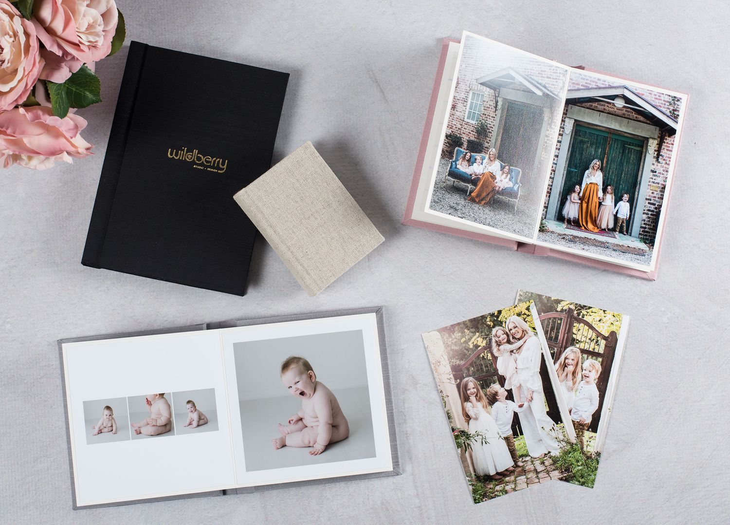 a display of photobooks, albums, photo prints