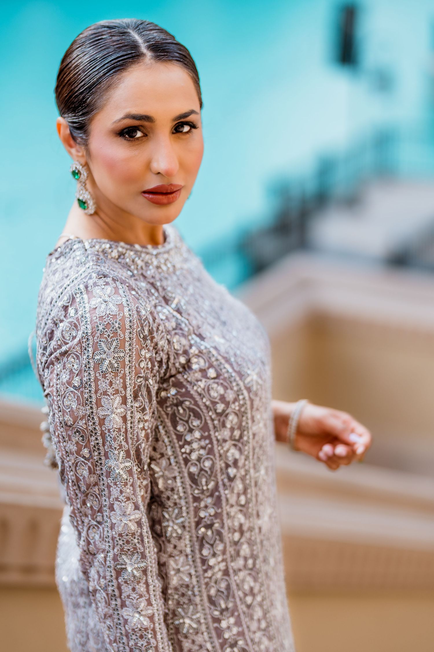 Close-up fashion portrait showing embroidered designer garment detail, Dubai fashion photographer