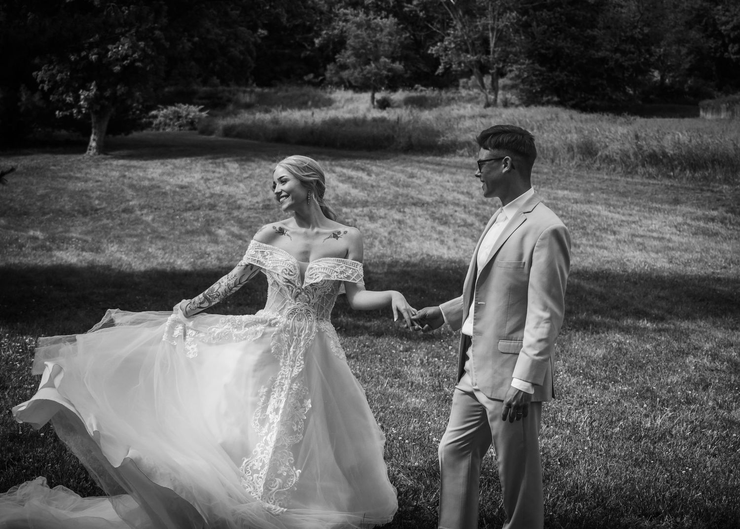 Groom getting full look of bride as she spins