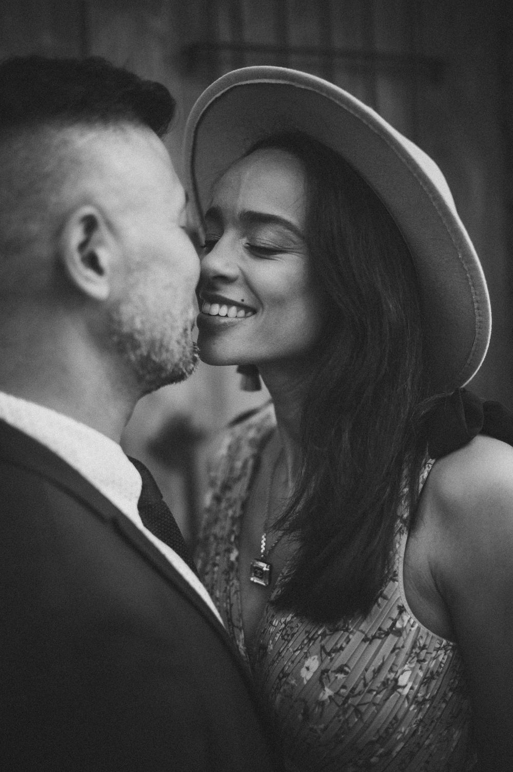 An intimate black and white portrait capturing a tender moment.