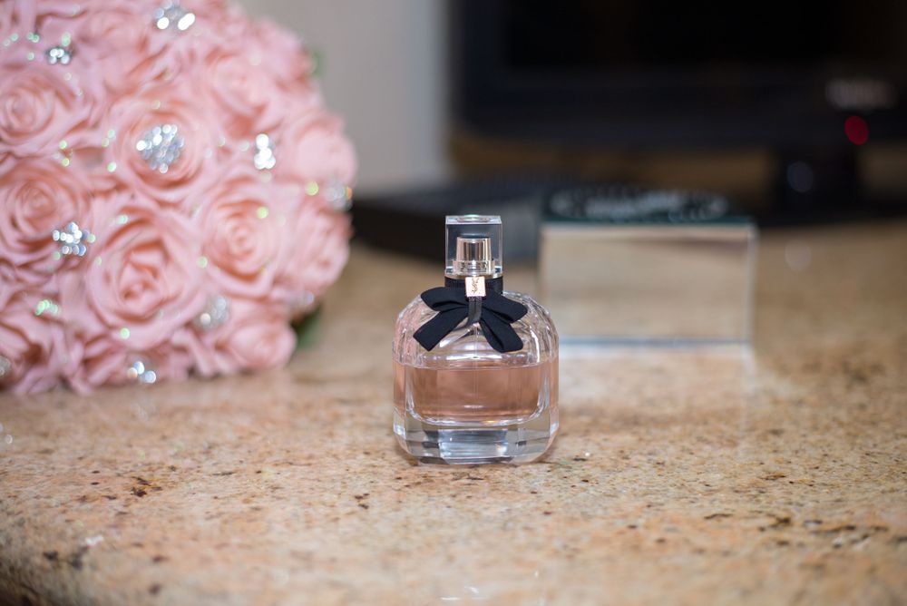 quinceanera perfume. getting ready. Corinthian Event Center. Mission, Texas. Wedding photography