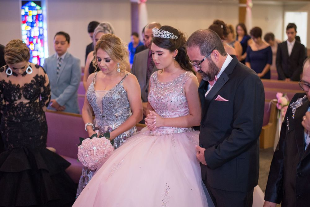 quinceanera praying. Corinthian Event Center. Mission, Texas. Wedding photography