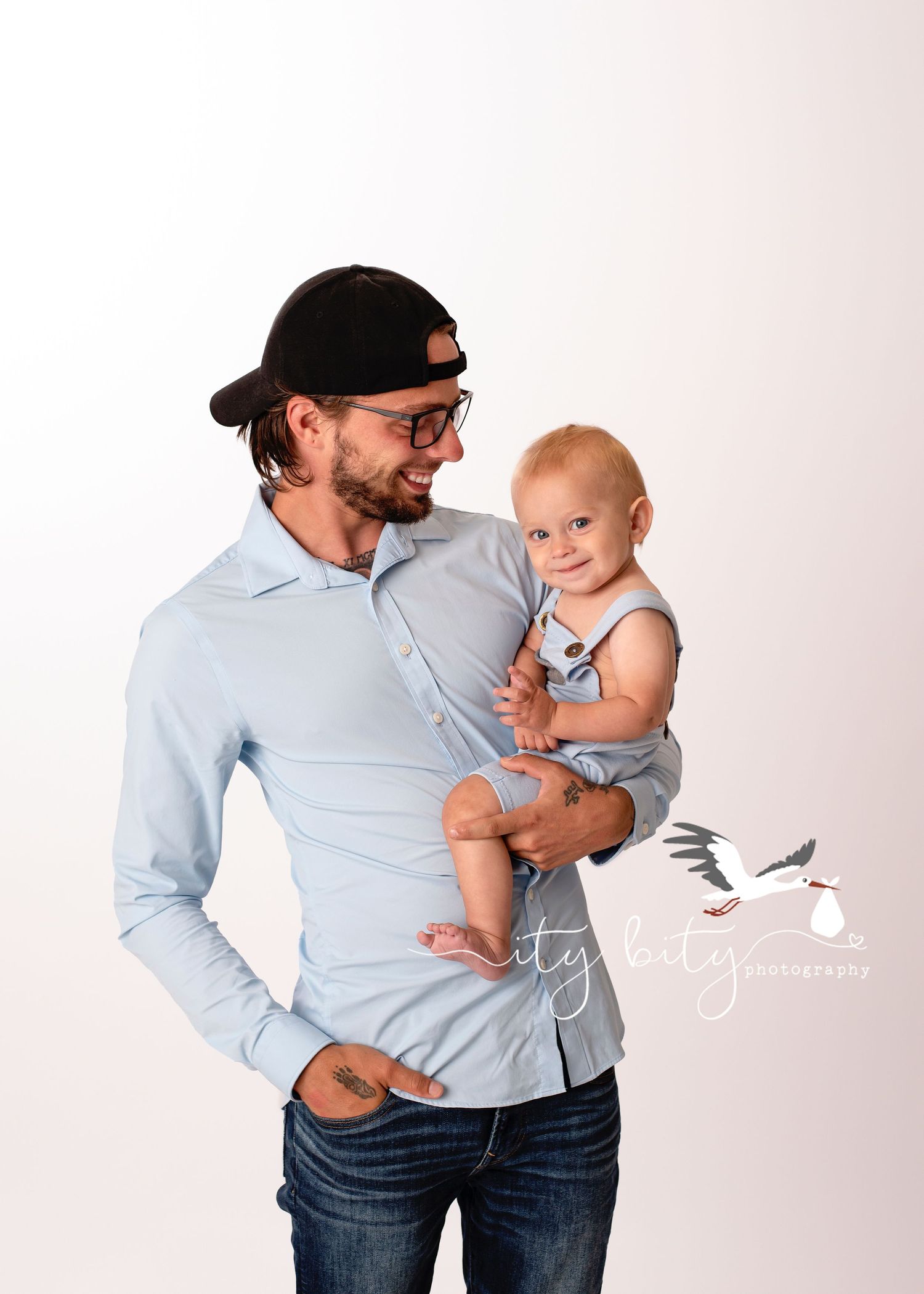 Dad & son during One Year Cake smash session Cleveland Photographer