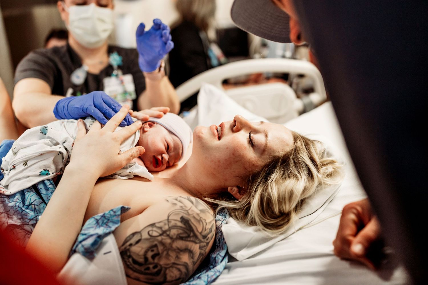 newborn baby birth captured baby being put on moms chest