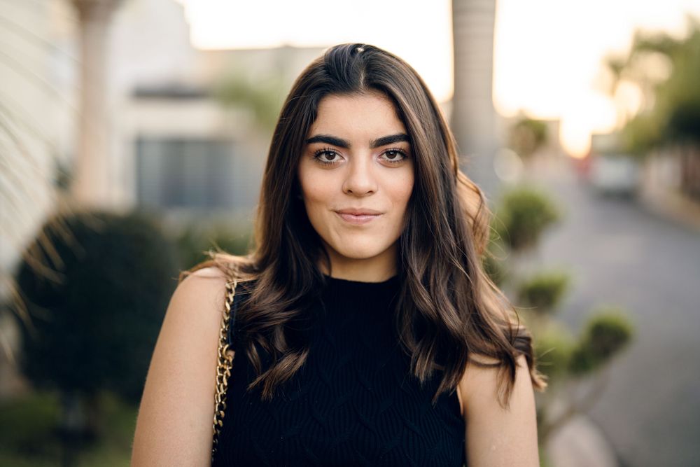 Outdoor lifestyle portrait session at sunset with natural lighting.