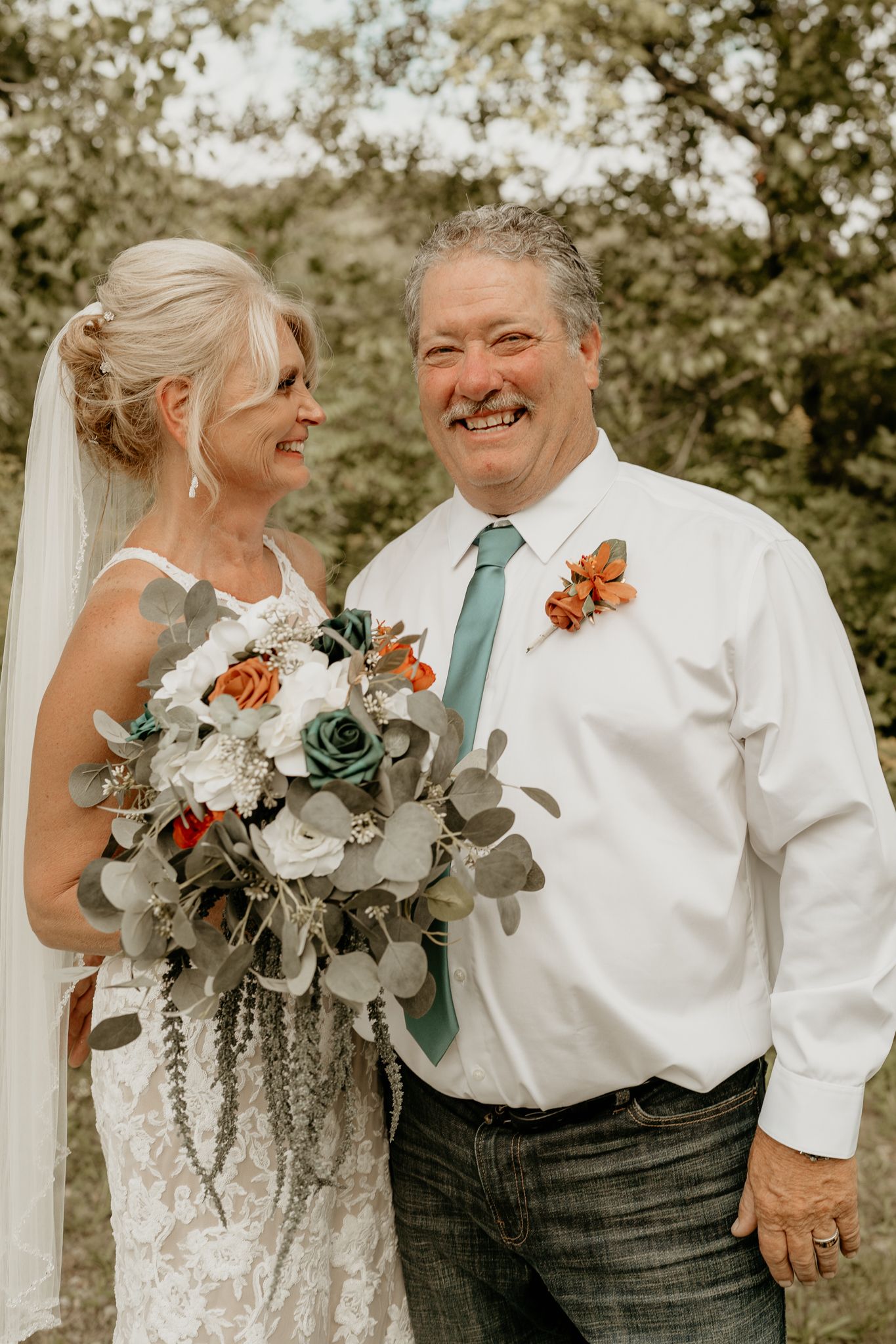 A joyful wedding moment captured in multiple frames showing a couple with a beautiful flower bouquet taken in Hanover MI