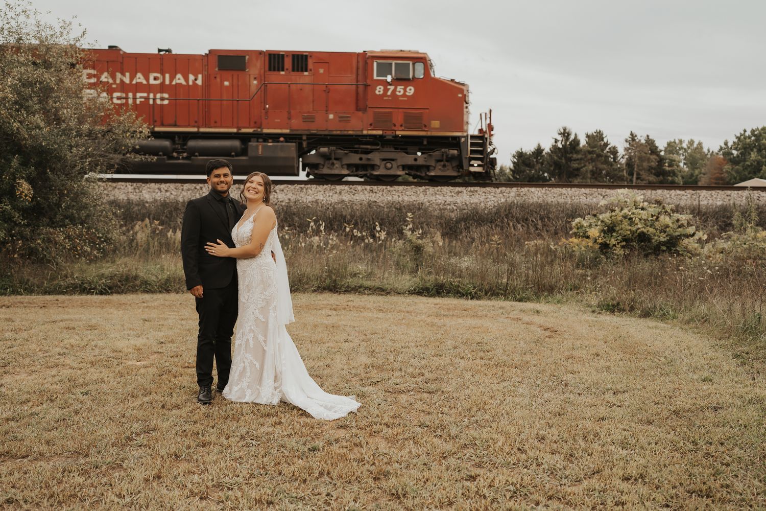 A series of wedding photos with a rustic red train car in the background during golden hour.