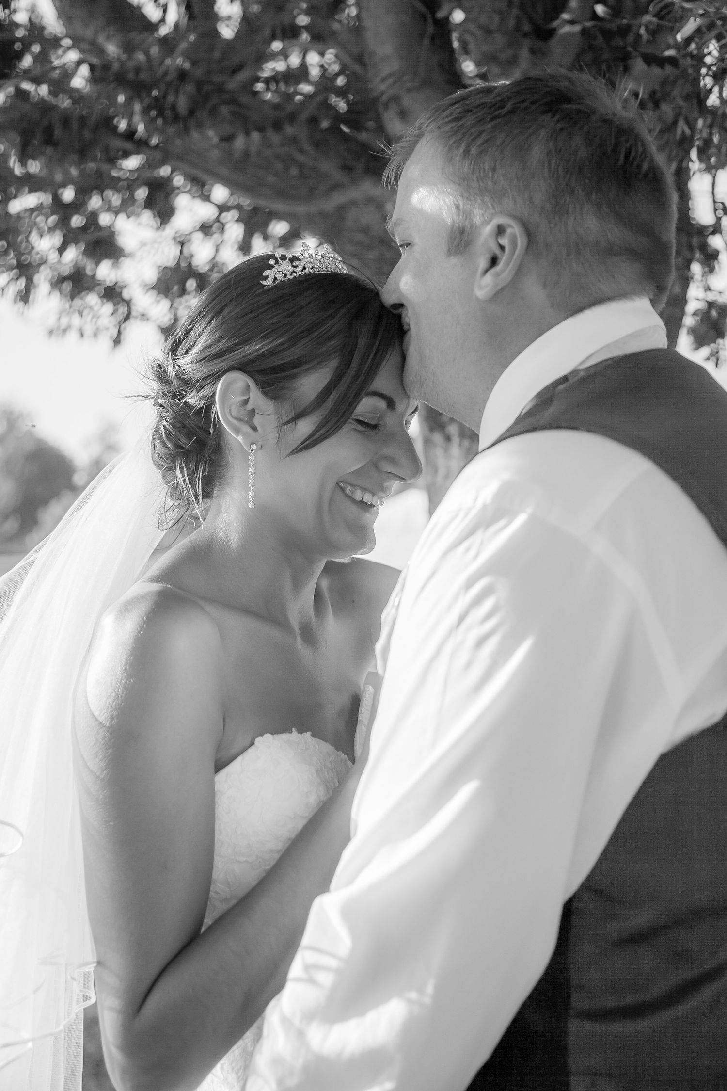 bride and groom stone in oxney cricket club Kent wedding photographer black and white