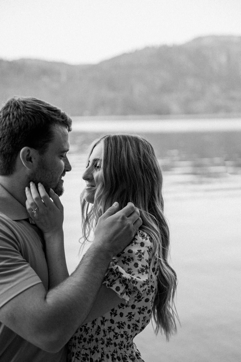 man and woman embrace  after getting engaged in Pinecrest, California