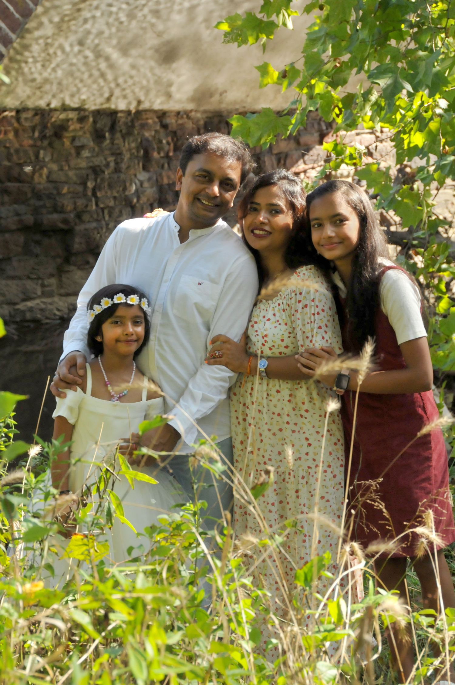 Family photo smiling near Stone Bridge Manassas Battlefield National Park