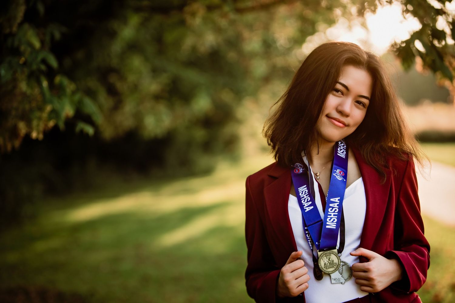 High School Senior Girl with Medals