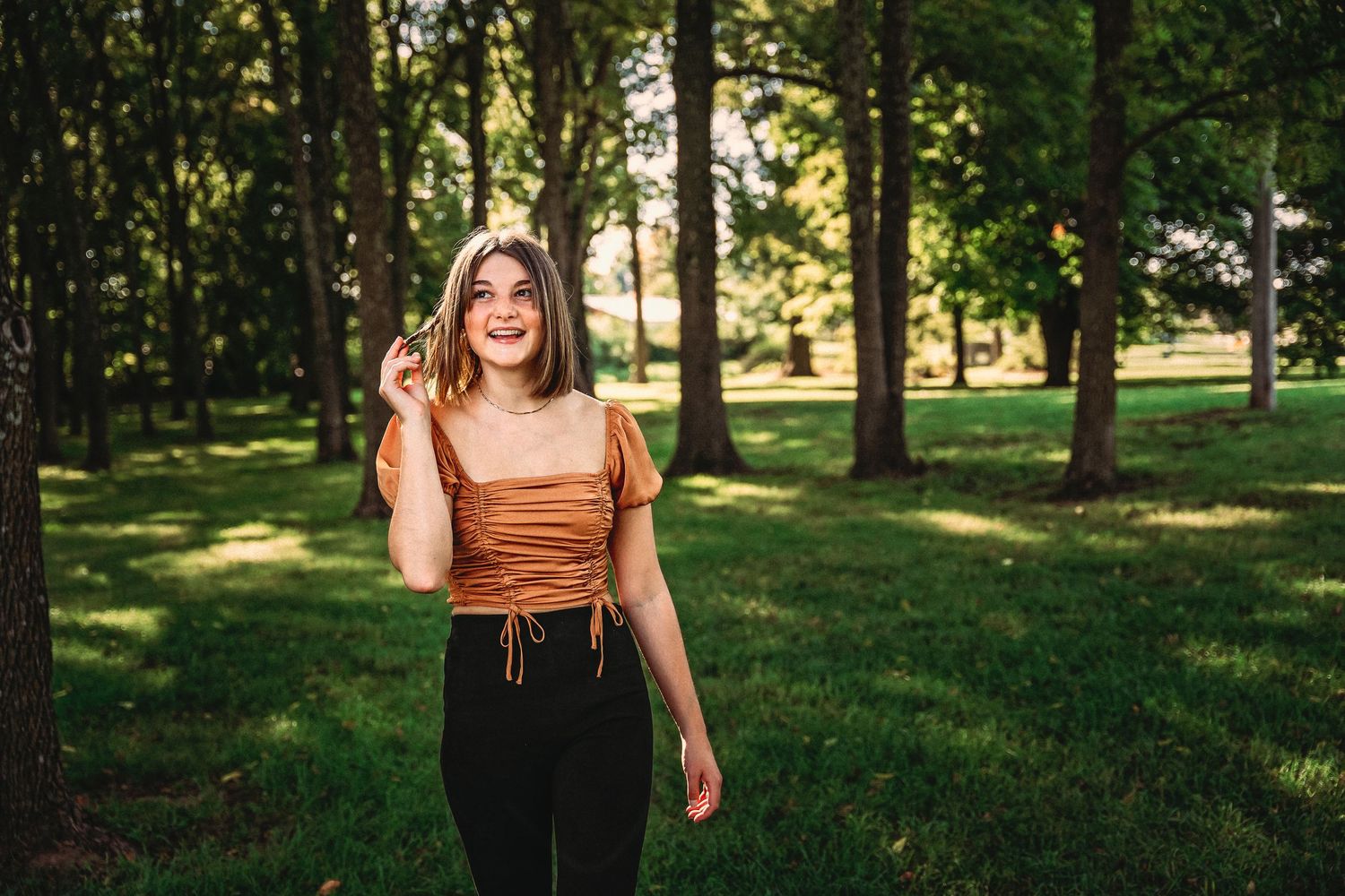 Walking portrait senior girl