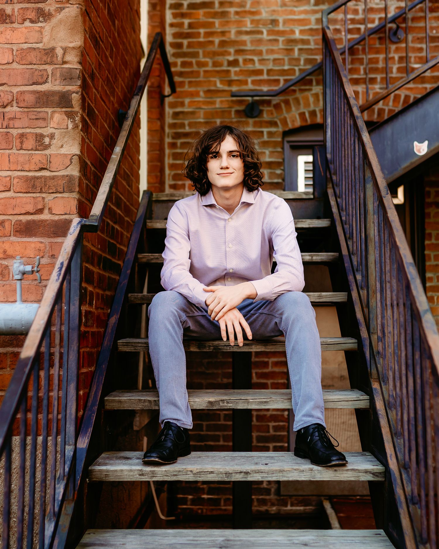 Senior Boy portrait sitting on stairs