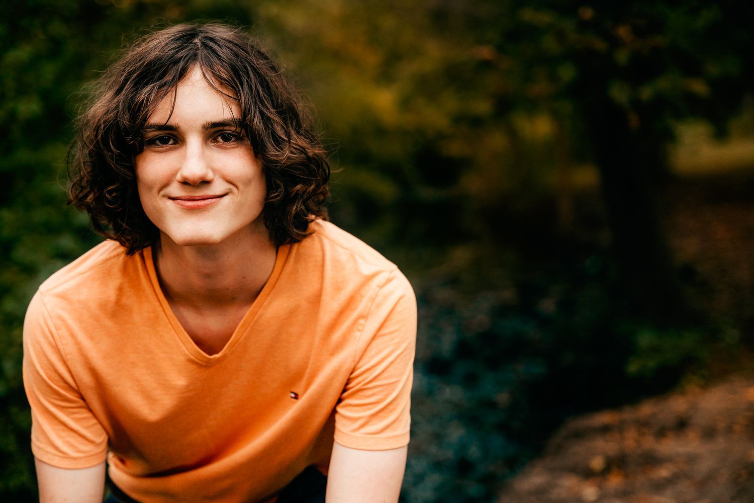 high school senior boy sitting looking forward
