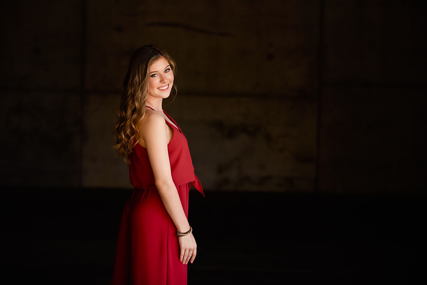 High School Senior girl posing in parking garage