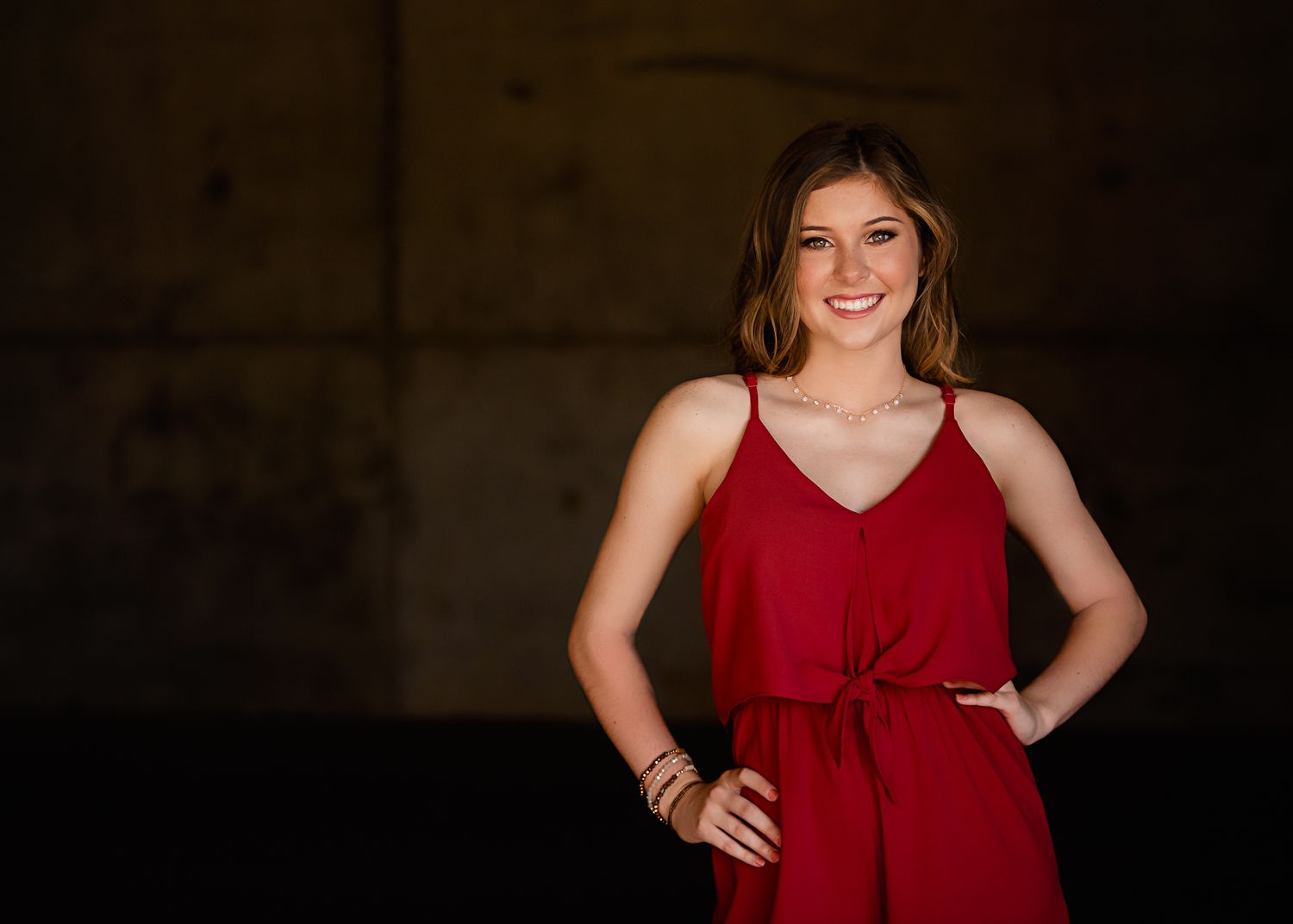 High School Senior girl posing in parking garage