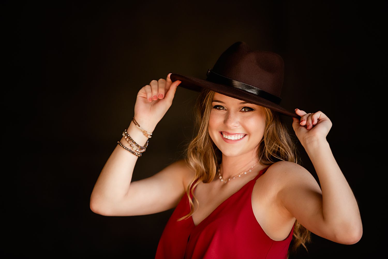 High School Senior girl posing in parking garage