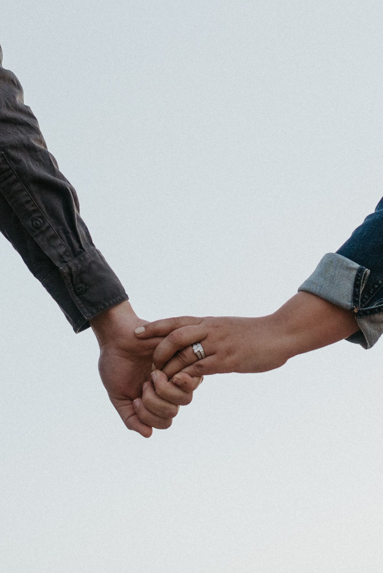 hand holding in fall engagement photograph