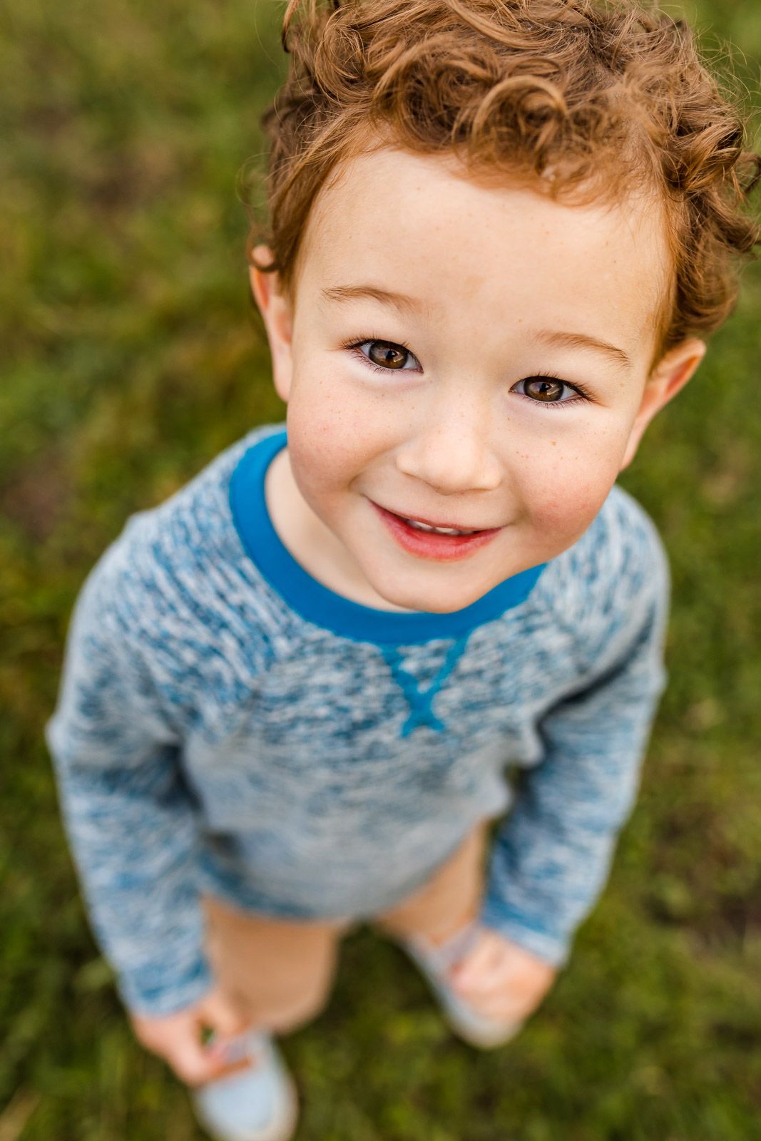 Bellevue family photographer capturing smiling portrait of a boy.
