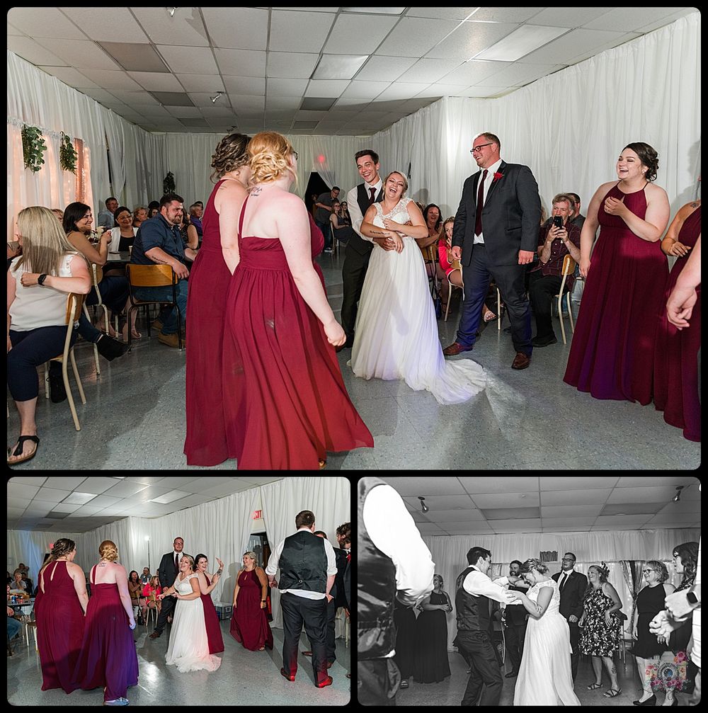 Wedding celebration with burgundy-dressed bridesmaids and guests dancing at reception venue.