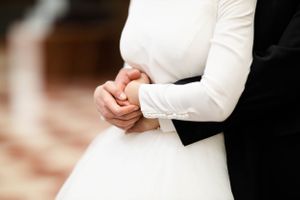 Bride and groom embrace