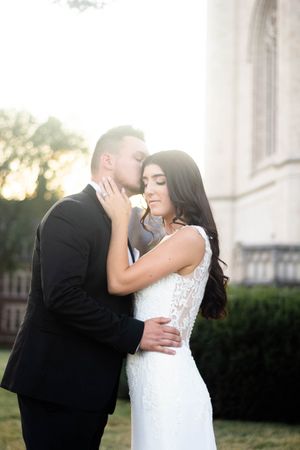 Bride and groom sweet sunset portrait