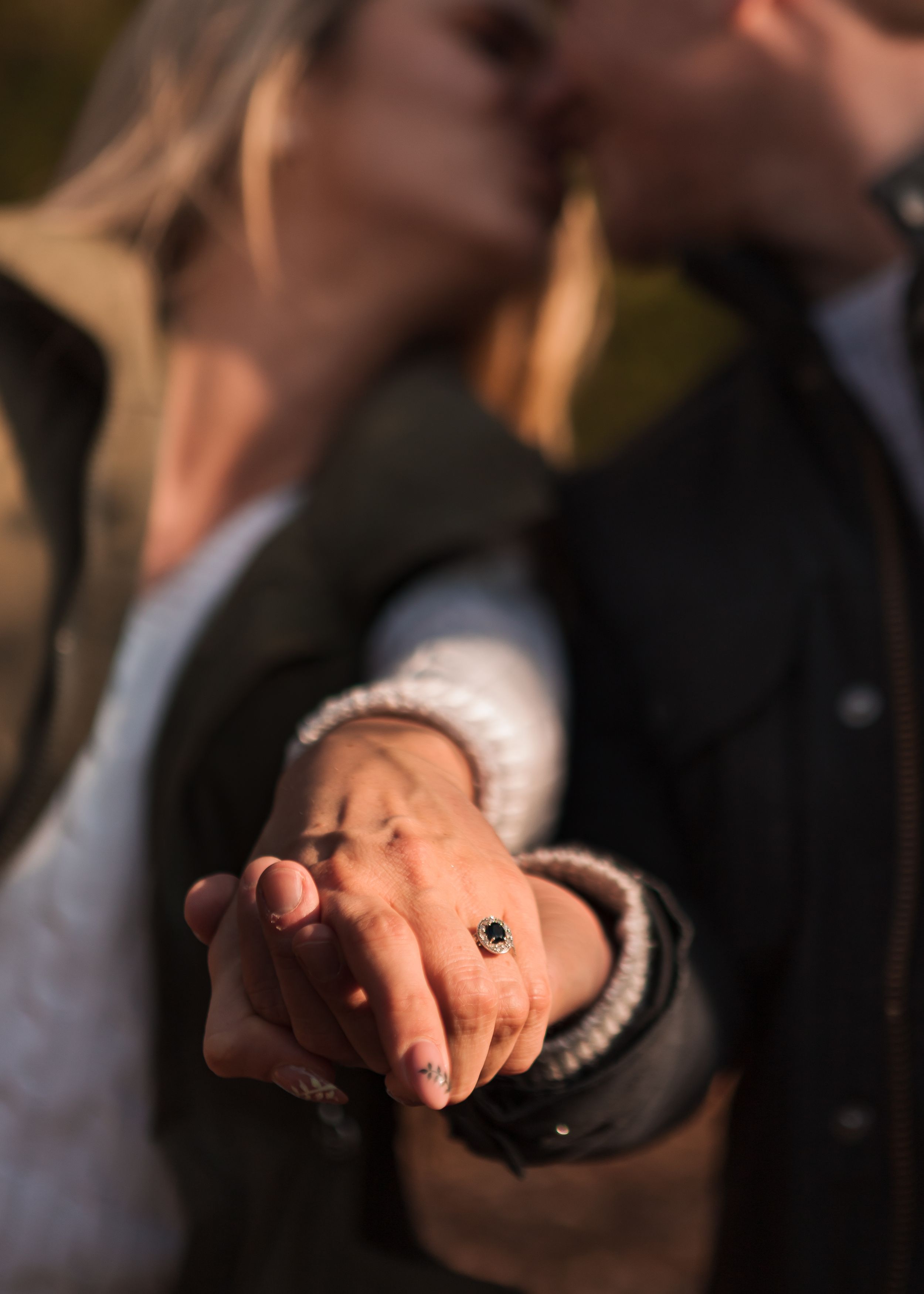 "engagement ring shot"