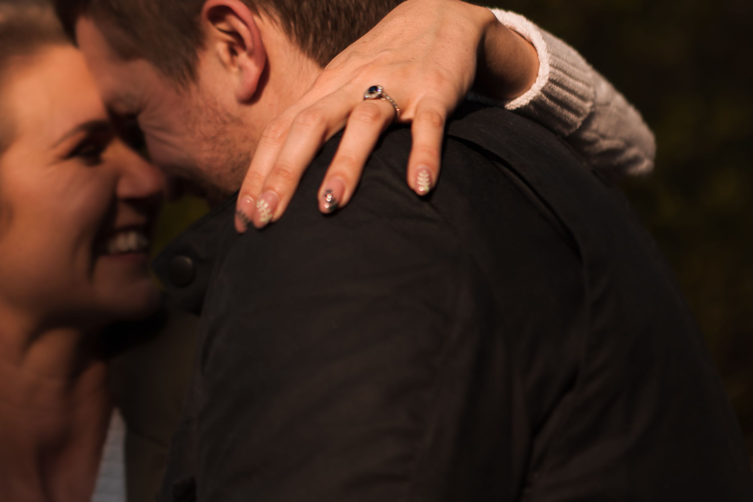 "engagement ring shot"