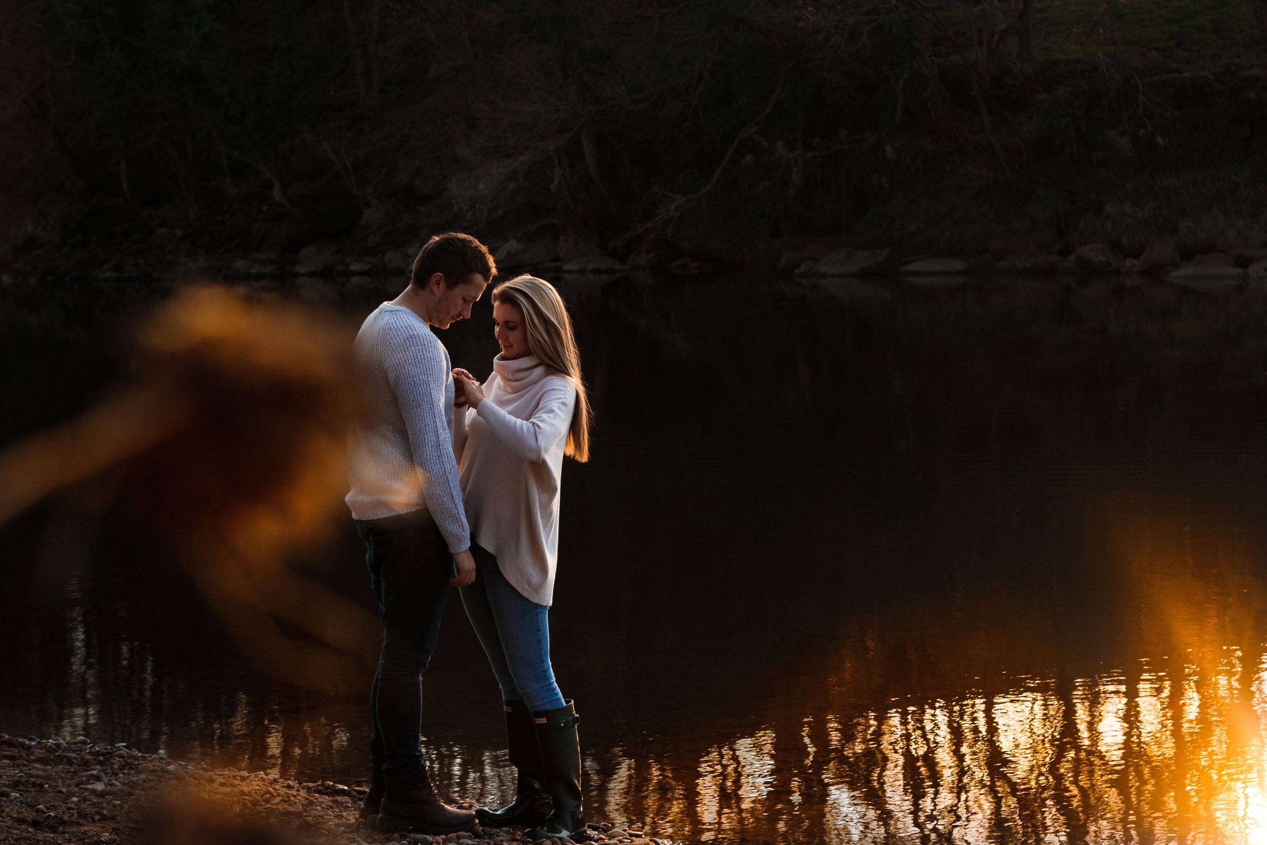 "engagement shoot river ribble looking at ring"