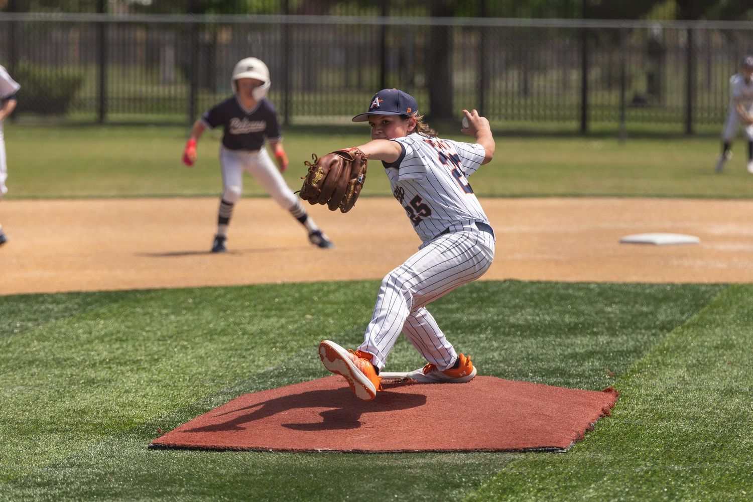 Baseball player pitching