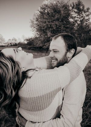 couple hugging and laughing during couples photoshoot