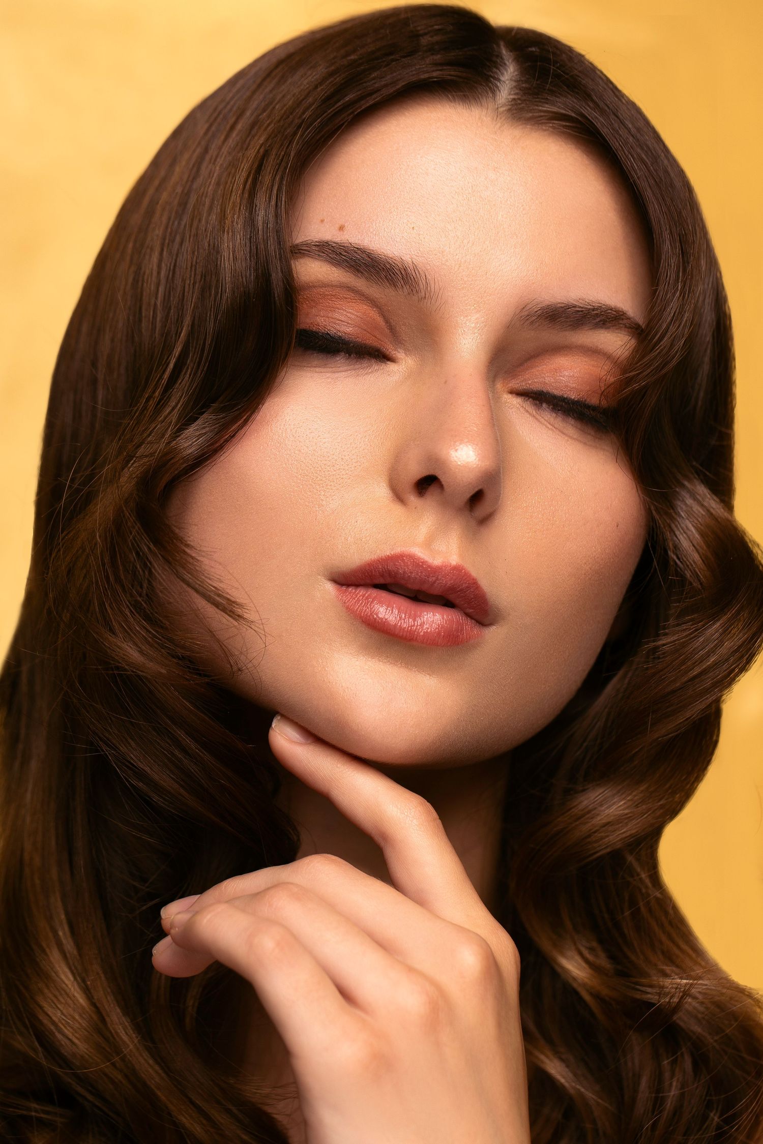 Beauty head shot with a gold theme.