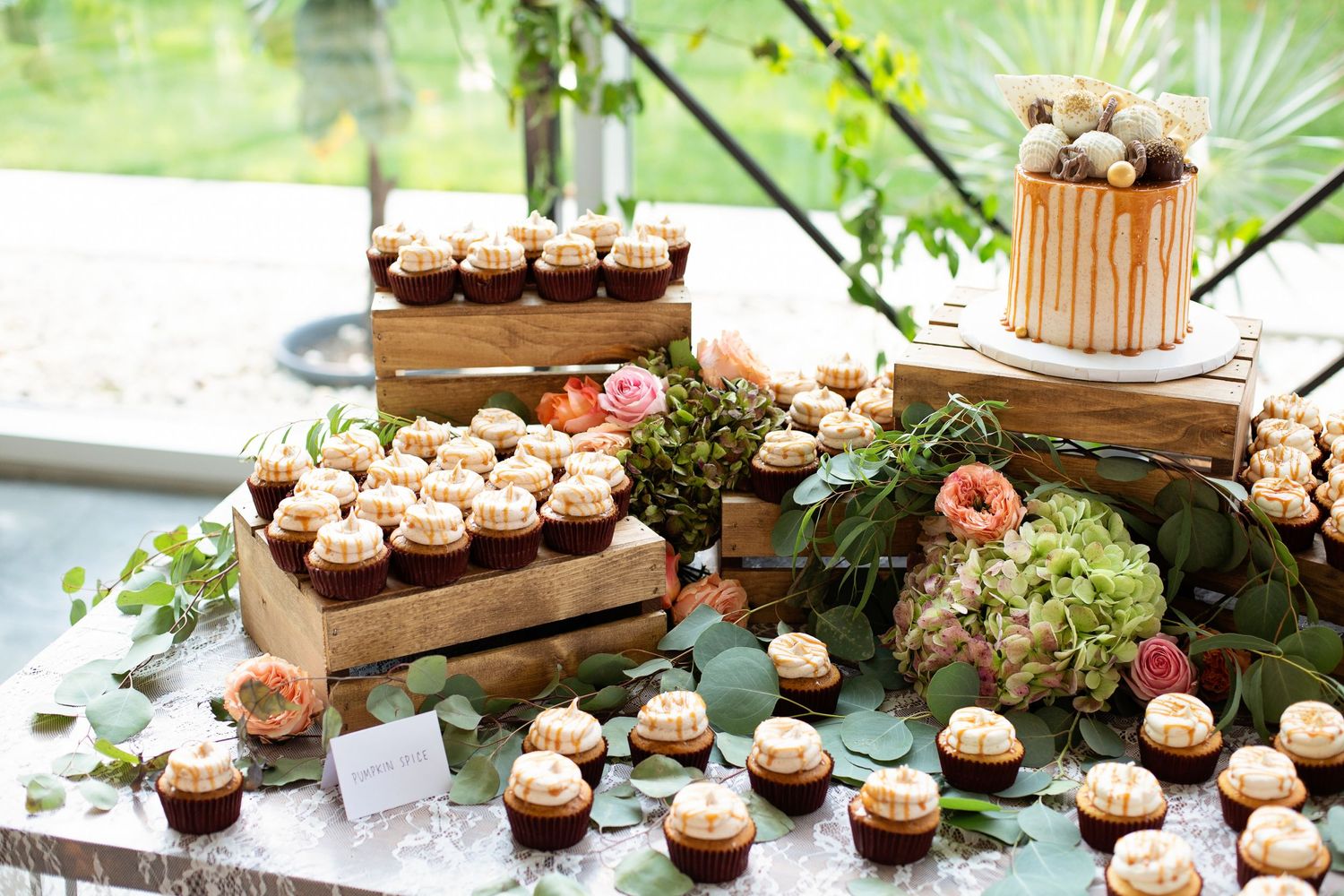 Wedding cake with Cupcakes at the Greenhouse Two Rivers
