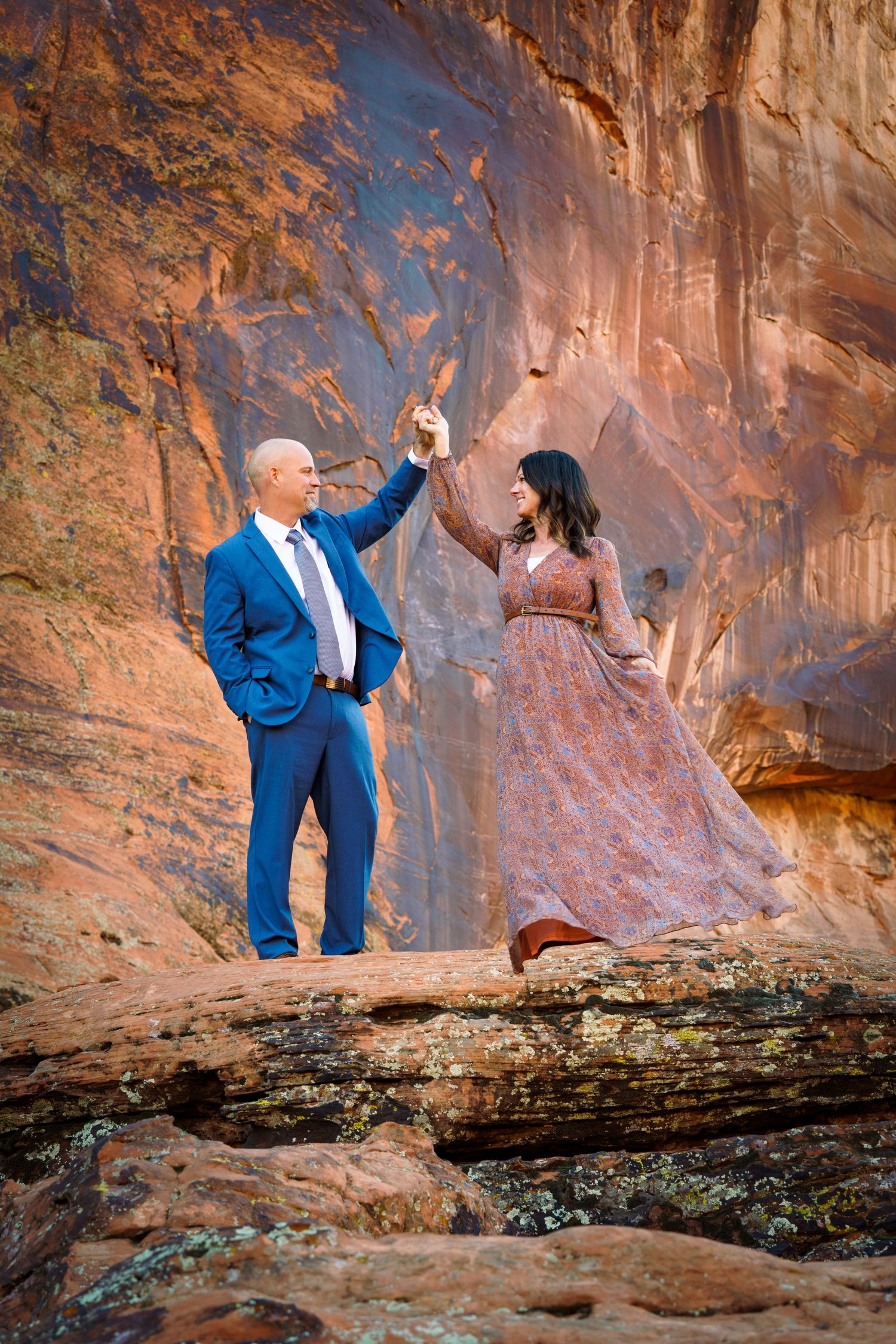 family-St. George-Utah-outdoor-reunion-groups-red-rocks-married-high-school-seniors-photography-margie-temme-bold-vibrant-sunset-headshots